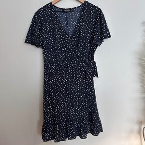Navy Polka Dot Ruffle Hem Wrap Dress